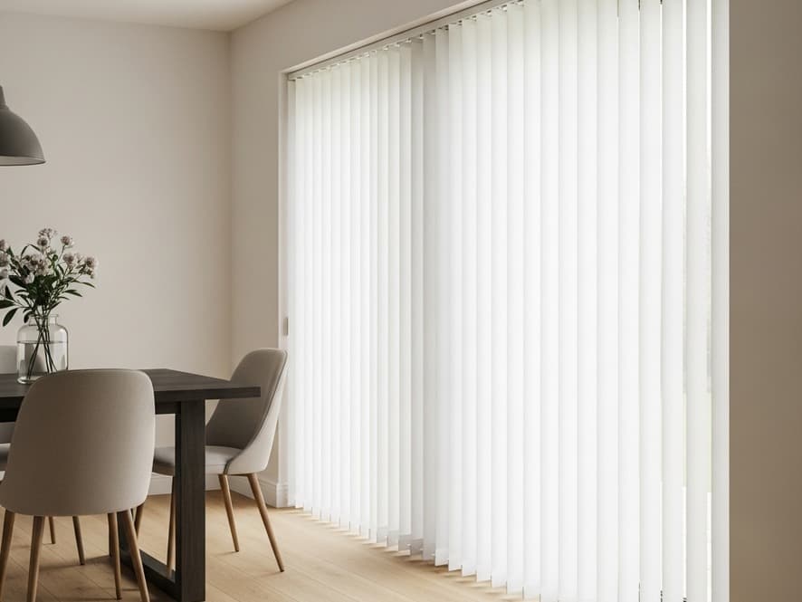 Approved white vertical blinds covering a wide glass opening